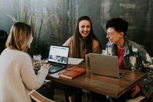 employees working and laughing